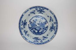 An 18th Century Chinese porcelain plate, Quinlong period decorated in blue and white with floral