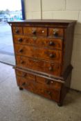 An 18th Century and later walnut veneered chest on chest, the top section with three small drawers