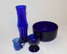 19th Century Bristol blue glass vase together with a small cream jug, bowl and further jug