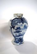 An 18th Century Delft vase with a pastoral scene (section of rim missing)