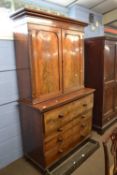 A Victorian mahogany secretaire bookcase cabinet, the top section with two panelled doors over a