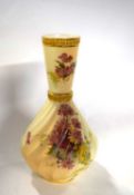 A Worcester vase of wrythen shape, the blush ground finely painted with flowers, 28cm high