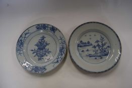 A pair of 18th Century Chinese porcelain plates, Quinlong period both with blue and white designs (
