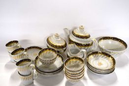 A late 19th Century English porcelain tea set, pattern number 61, comprising two pot sucrier, milk