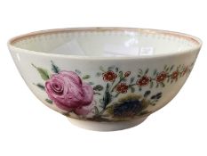 A small Lowestoft porcelain slop bowl, circa 1770 with a design of flowers, 12cm diameter