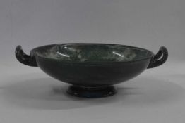 A Royal Doulton titanian bowl with two loop handles and typical mottled grey design, 27cm diameter