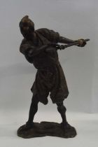 A Spelter model of a Samurai warrior Meiji period on shaped base, 40cm high