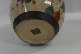 A Chinese porcelain crackle ware ginger jar with famille vert decoration of Chinese warriors