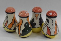 Two salt and pepper by Lorna Bailey, decorated in Clarice Cliff style