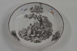 An English porcelain dish, probably Coalport with a printed design of a couple drawing water at a