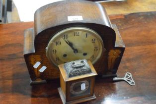 An early 20th Century dome topped mantel clock together with a further small Smiths bedside clock (