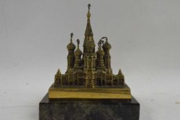 Russian Interest - A small brass and marble mounted model of the Cathedral of St Basil, Moscow, 11cm