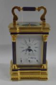 L'Eppe extremely good quality contemporary brass cased carriage clock, the case mounted with lapis