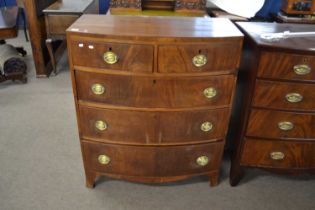 Late Georgian mahogany bow front chest of two short over three long drawers with oval brass plate