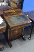 Late Victorian rosewood Davenport desk of typical form, the body decorated with inlaid detail,