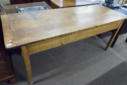 A 19th Century rectangular country kitchen table, possibly fruit wood and elm with single end drawer