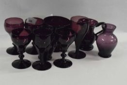 A collection of late 18th/ 19th Century Bristol amethyst coloured glass including six glasses, small