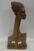 Carved figure of a tribal head in Haganeur style, 50cm high