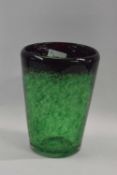 A heavy Art Glass vase with a mottled green and white design, 20cm high