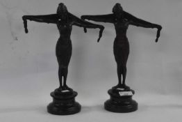 A pair of Art Deco models of ladies after Chiparus (reproduction), 32cm high