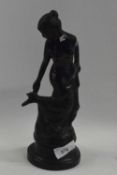 A Spelter model of a young girl