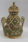 A Herend vase and cover, 19th Century with a pierced or reticulated design on a shaped gourd base,