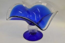 A large Art Glass bowl coloured blue on balustre stem, 40cm diameter