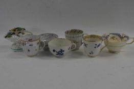 Group of English porcelain, 19th Century including a Worcester cup with blue flowers decoration, a