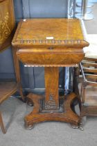 An unusual mid 19th Century Pollared oak pedestal teapoy with hinged lid opening to a fitted