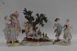 A continental porcelain group, late 19th Century, probably Volkstedt (a/f) together with two smaller