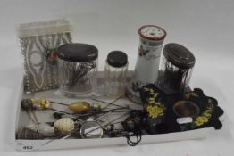 Mixed Lot: Small silver topped dressing table jars, various hat pins, hat pin stand, pocket watch