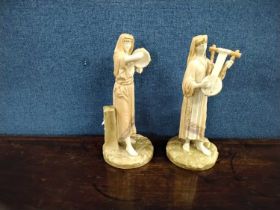 A pair of Royal Worcester Hadley figures of musicians on circular bases, factory mark and shape 1084