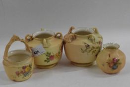 A group of early 20th Century Worcester blush ground wares with painted flowers including a pair