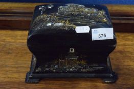 A Victorian black lacquer and mother of pearl inlaid tea caddy of wasted form, 20cm wide