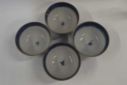 Two pairs of early 19th century Chinese bowls and saucers - with blue decoration - retaining