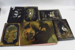 A collection of various Victorian papier mache black lacquer guilded mother of pearl inlaid book