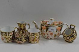 Group of Crown Derby Imari style wares including a teapot, miniature tyg, pill box and cover,
