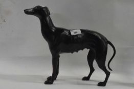 A metal model of a greyhound painted black, 30cm high