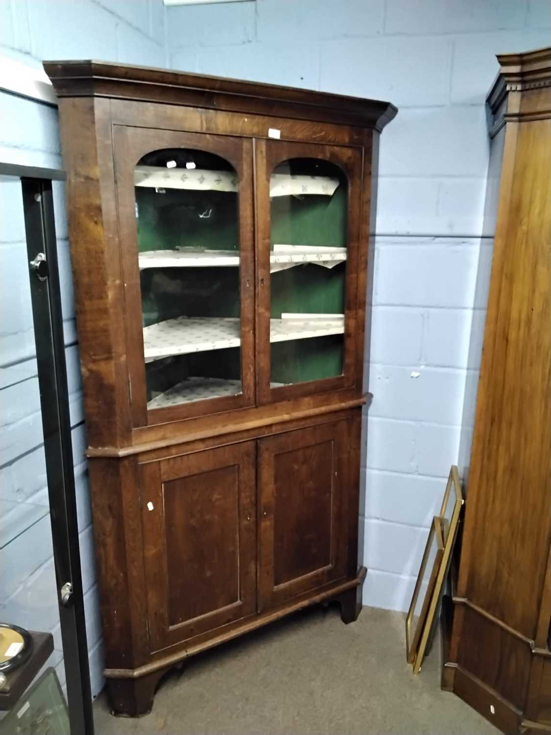 Large 19th Century oak two piece floor standing corner cabinet with glazed top section over a