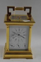 L'Epee, a good quality contemporary French brass cased carriage clock with white enamel dial with