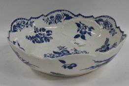 A Worcester porcelain salad bowl circa 1770 with scalloped rim and blue and white printed pine