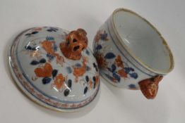 An 18th Century Chinese porcelain small tureen and cover with an Imari design and rabbit handles,