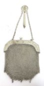 Chinese export silver mesh chain purse, the frame chased and engraved with leaves and buds,