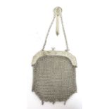 Chinese export silver mesh chain purse, the frame chased and engraved with leaves and buds,