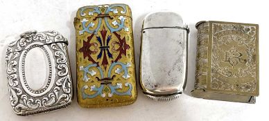 Mixed lot to include four various vesta's a gilt metal and enamel example, two silver plated