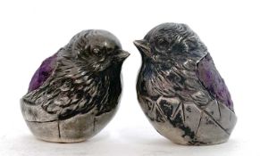 Two small Sampson Mordan & Co silver 'chick' pin cushions in the form of a chick emerging from an