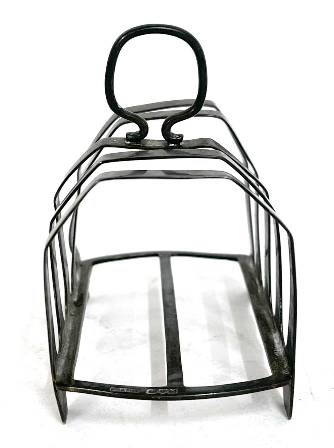 George V small toast rack of five divisions and having a loop carrying handle on a stretcher base, - Image 2 of 6