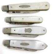 Group of four silver bladed and mother of pearl handled folding fruit knives, three with plain