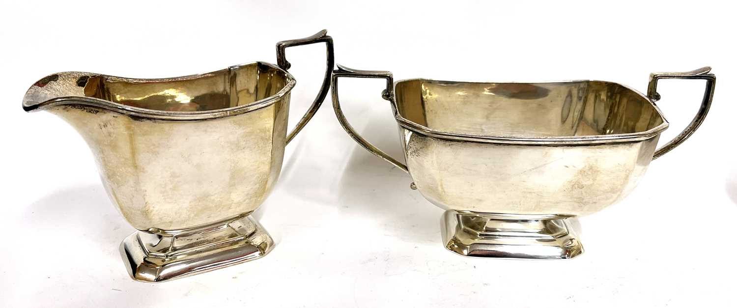 Art Deco silver three piece tea set of plain panelled form comprising teapot, sugar bowl and cream - Image 9 of 9