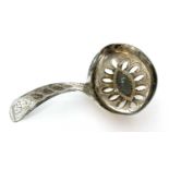 George IV silver caddy spoon with pierced circular over bowl having wrigglework detail and